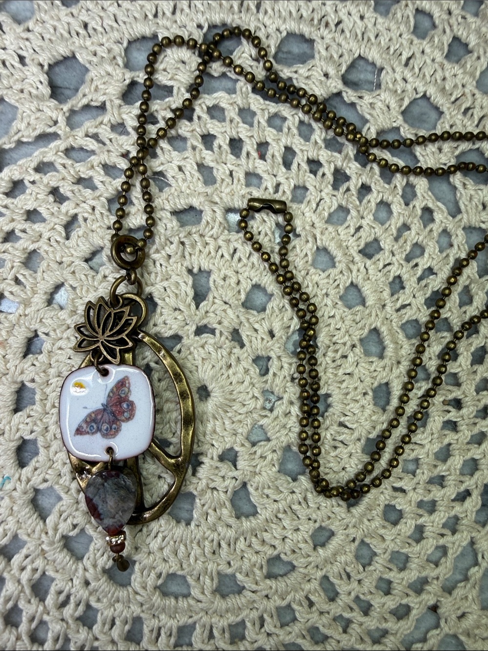 Vintage-Inspired Bronze Lotus Butterfly Pendant 26” Necklace in White and Brown